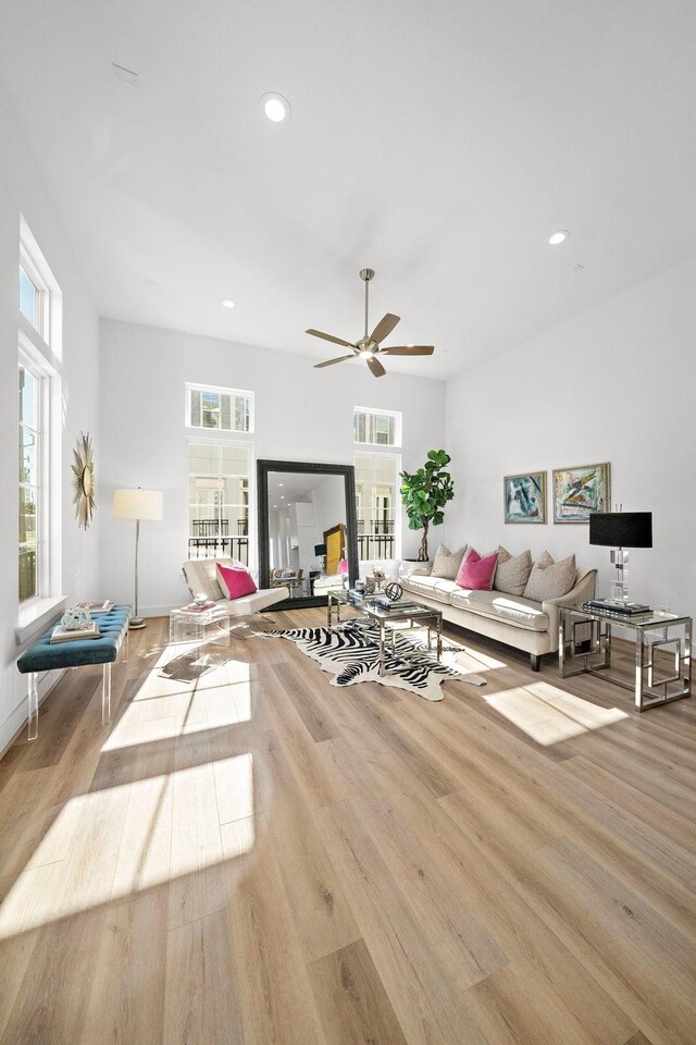 11120 Savannah Woods Ln, Houston, TX 77043 - living room with wood finished floors, recessed lighting, and a ceiling fan
