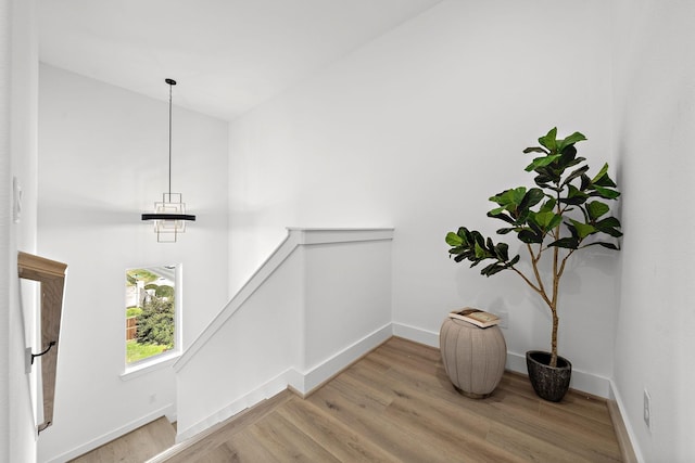 11120 Savannah Woods Ln, Houston, TX 77043 - stairs with wood finished floors and baseboards