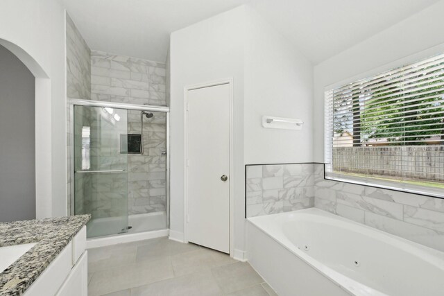 2707 Shawna Lyn Dr, Spring, TX 77373 - bathroom featuring a jetted tub, a stall shower, vanity, and tile patterned floors