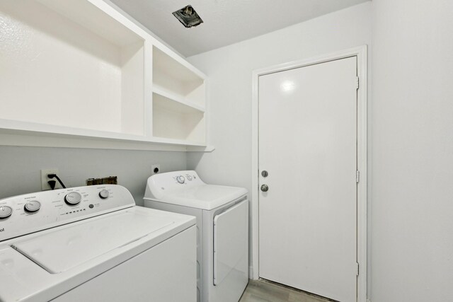 2707 Shawna Lyn Dr, Spring, TX 77373 - laundry area with washer and dryer