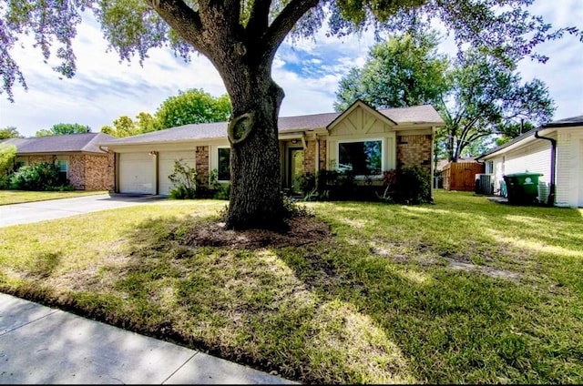 5807 Silver Forest Dr, Houston, TX 77092 - ranch-style home featuring brick siding, driveway, and a garage