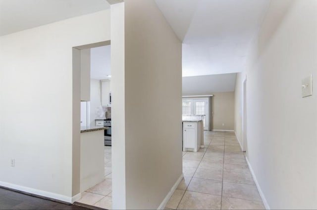 5807 Silver Forest Dr, Houston, TX 77092 - hall with light tile patterned floors and baseboards