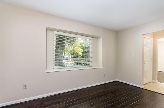 5807 Silver Forest Dr, Houston, TX 77092 - spare room with wood finished floors and baseboards