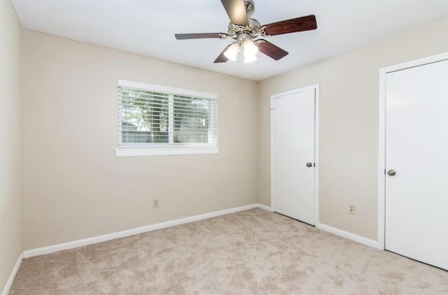 5807 Silver Forest Dr, Houston, TX 77092 - unfurnished bedroom featuring carpet and a ceiling fan