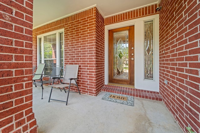 2223 Caroline Park Ln, Spring, TX 77386 - doorway to property with a porch and brick siding