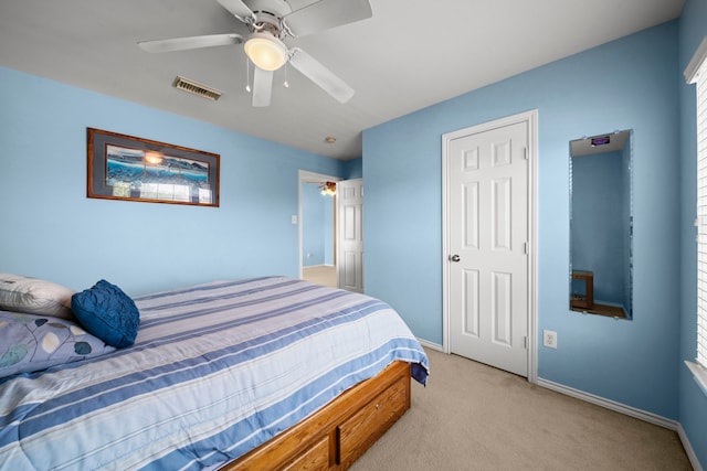 2223 Caroline Park Ln, Spring, TX 77386 - bedroom featuring light colored carpet, baseboards, and a ceiling fan