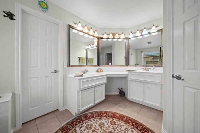 2223 Caroline Park Ln, Spring, TX 77386 - bathroom with double vanity and tile patterned flooring