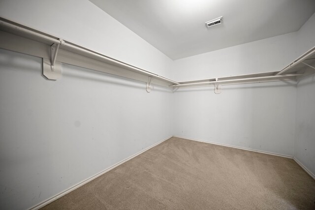 2223 Caroline Park Ln, Spring, TX 77386 - walk in closet with carpet