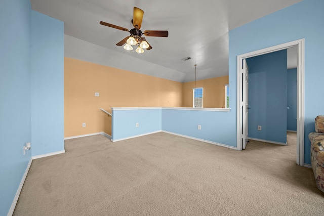 2223 Caroline Park Ln, Spring, TX 77386 - empty room featuring carpet, ceiling fan, and baseboards