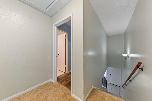 6506 Kentwick Dr, Houston, TX 77084 - stairway featuring carpet flooring and baseboards