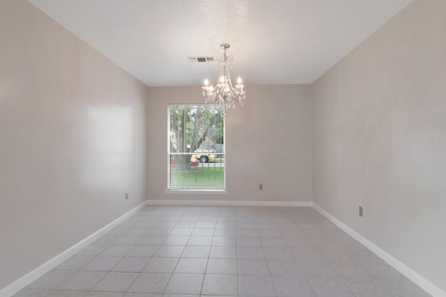 11014 Kirkridge Dr, Houston, TX 77089 - spare room featuring a chandelier, light tile patterned flooring, and baseboards