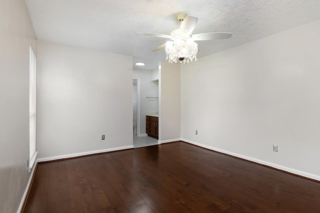 11014 Kirkridge Dr, Houston, TX 77089 - empty room with a ceiling fan, wood finished floors, baseboards, and a textured ceiling