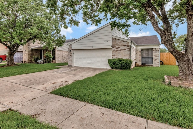 11014 Kirkridge Dr, Houston, TX 77089 - mid-century home featuring brick siding, concrete driveway, and a garage