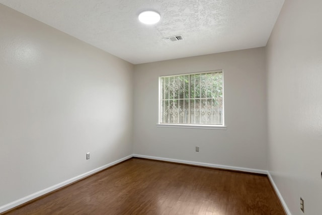 11014 Kirkridge Dr, Houston, TX 77089 - empty room with dark wood-style flooring and baseboards
