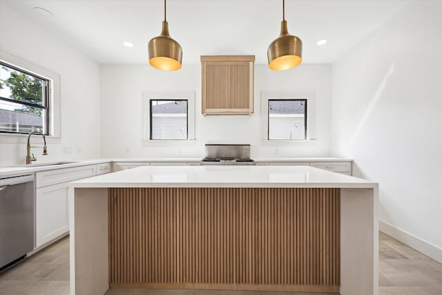 1546 Lawson St, Houston, TX 77023 - kitchen featuring dishwasher, range, light countertops, a sink, and recessed lighting