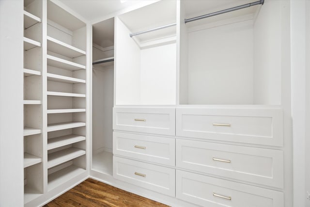 1546 Lawson St, Houston, TX 77023 - walk in closet with dark wood-type flooring