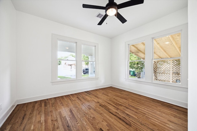 1546 Lawson St, Houston, TX 77023 - spare room with healthy amount of natural light, wood finished floors, baseboards, and ceiling fan