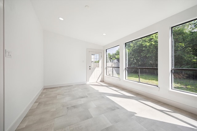 1546 Lawson St, Houston, TX 77023 - empty room featuring recessed lighting, baseboards, and lofted ceiling