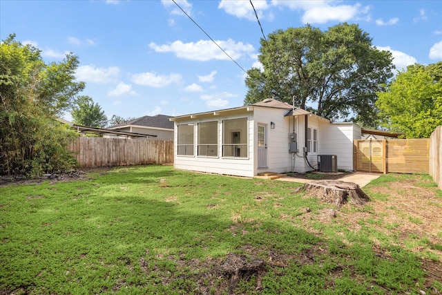 1546 Lawson St, Houston, TX 77023 - back of house featuring a sunroom and central AC