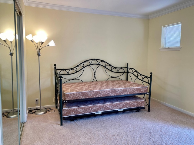 2478 Bering Dr Unit 2478, Houston, TX 77057 - carpeted bedroom featuring ornamental molding, baseboards, and a closet