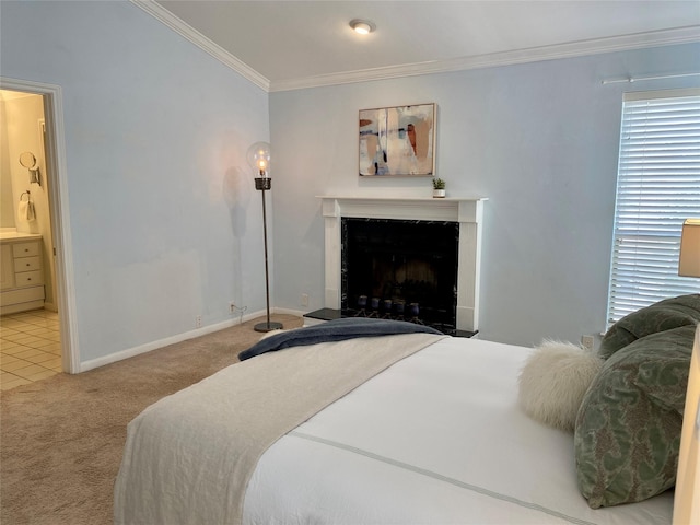 2478 Bering Dr Unit 2478, Houston, TX 77057 - carpeted bedroom with crown molding, a fireplace, baseboards, and ensuite bath