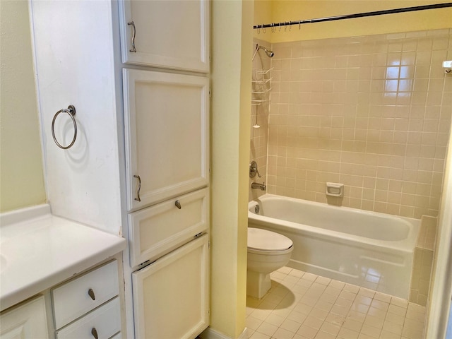 2478 Bering Dr Unit 2478, Houston, TX 77057 - bathroom with toilet, tile patterned flooring, vanity, and washtub / shower combination