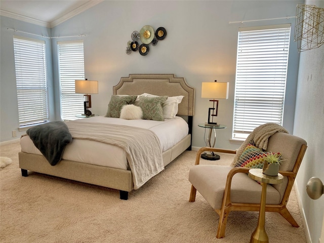 2478 Bering Dr Unit 2478, Houston, TX 77057 - bedroom featuring light carpet, crown molding, baseboards, multiple windows, and lofted ceiling
