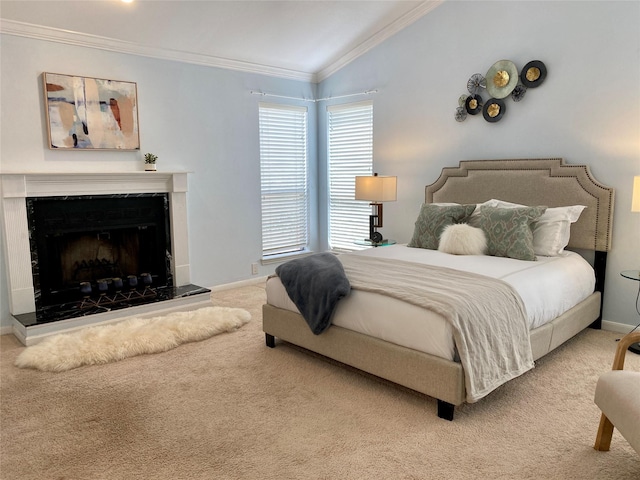 2478 Bering Dr Unit 2478, Houston, TX 77057 - carpeted bedroom featuring vaulted ceiling, crown molding, baseboards, and a premium fireplace