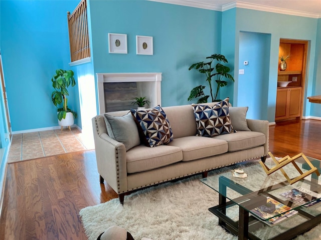 2478 Bering Dr Unit 2478, Houston, TX 77057 - living room with ornamental molding, wood finished floors, and baseboards