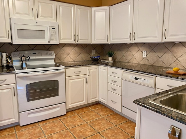 2478 Bering Dr Unit 2478, Houston, TX 77057 - kitchen with white appliances, white cabinetry, tasteful backsplash, and dark stone countertops