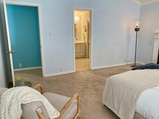 2478 Bering Dr Unit 2478, Houston, TX 77057 - carpeted bedroom with baseboards, ornamental molding, and ensuite bathroom