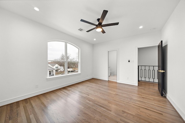 1013 E 28th St, Houston, TX 77009 - spare room featuring a ceiling fan, light wood-style flooring, baseboards, and recessed lighting
