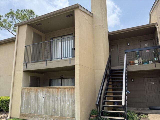 3300 Pebblebrook Dr Unit 106, Seabrook, TX 77586 - view of property with stairway