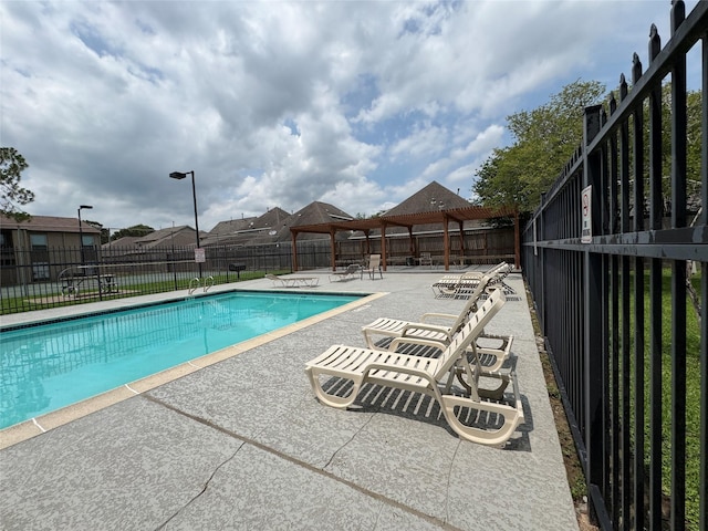 3300 Pebblebrook Dr Unit 106, Seabrook, TX 77586 - community pool with a patio and a pergola