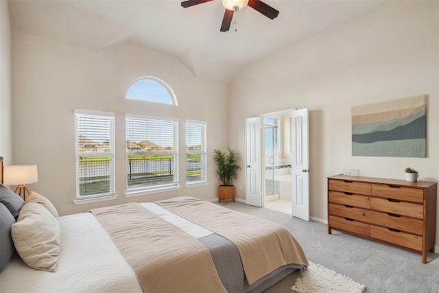 4310 Treccia Ct, Katy, TX 77493 - bedroom with light carpet, high vaulted ceiling, ensuite bathroom, a ceiling fan, and baseboards