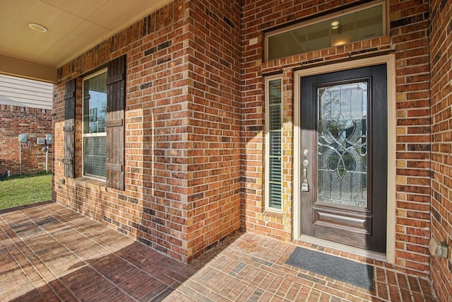 4310 Treccia Ct, Katy, TX 77493 - doorway to property with brick siding and covered porch