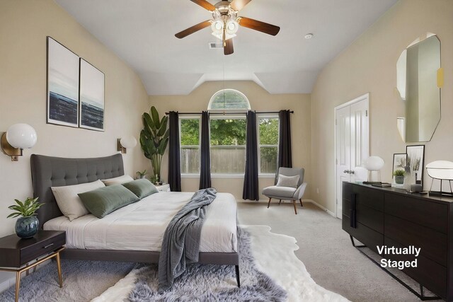122 Jacobs Meadow Dr, Conroe, TX 77384 - bedroom featuring light colored carpet, baseboards, vaulted ceiling, and ceiling fan