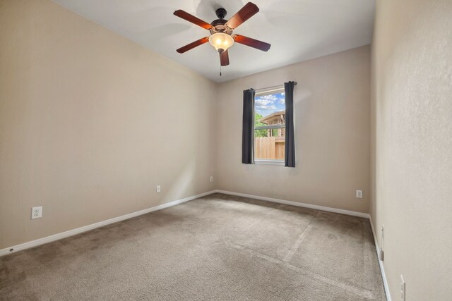 122 Jacobs Meadow Dr, Conroe, TX 77384 - carpeted spare room featuring baseboards and a ceiling fan