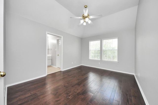 8742 Melting Shadows Ln, Houston, TX 77095 - spare room with a ceiling fan, hardwood / wood-style flooring, baseboards, and vaulted ceiling