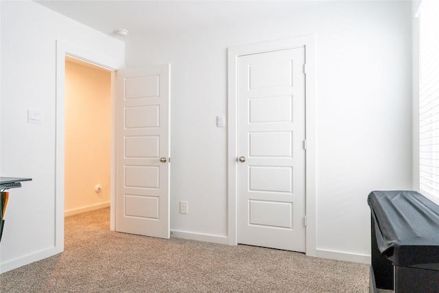 12327 Brandenburg Gate Dr, Houston, TX 77047 - carpeted bedroom with baseboards