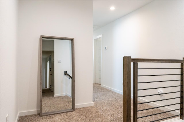 12327 Brandenburg Gate Dr, Houston, TX 77047 - corridor featuring an upstairs landing, light colored carpet, and baseboards