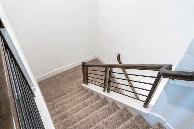 12327 Brandenburg Gate Dr, Houston, TX 77047 - stairway with carpet flooring and baseboards