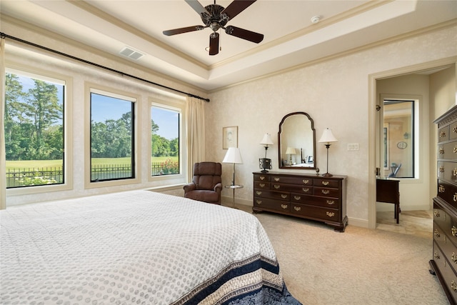 16119 Villa Fontana Way, Houston, TX 77068 - bedroom with multiple windows, ornamental molding, a tray ceiling, and baseboards