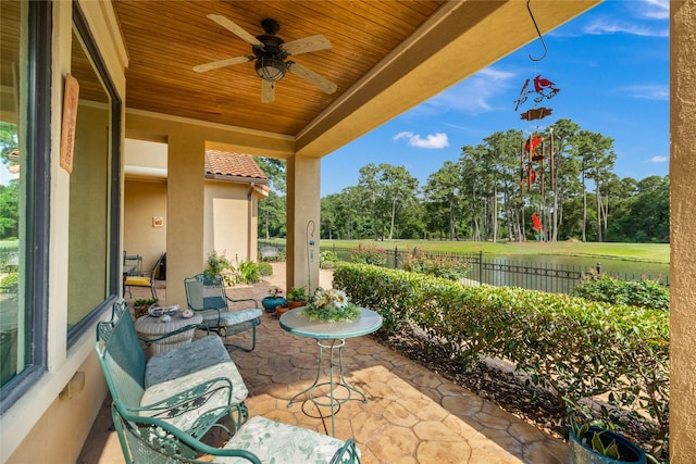 16119 Villa Fontana Way, Houston, TX 77068 - view of patio / terrace with a ceiling fan and view of scattered trees