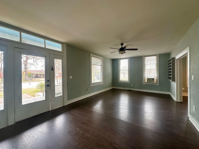 236 8th St, Somerville, TX 77879 - entryway featuring wood finished floors, ceiling fan, and baseboards