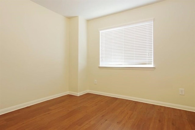 15415 Bammel Oaks Ct, Houston, TX 77014 - empty room with wood finished floors and baseboards