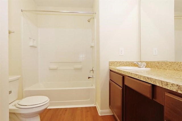 15415 Bammel Oaks Ct, Houston, TX 77014 - full bathroom featuring wood finished floors, vanity, toilet, and washtub / shower combination
