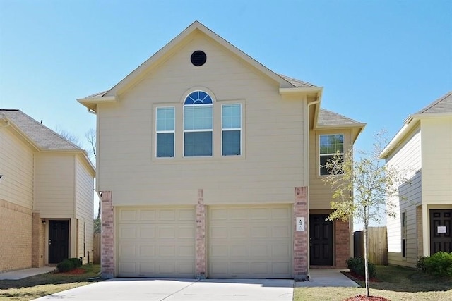 15415 Bammel Oaks Ct, Houston, TX 77014 - view of front of home with driveway, a garage, and brick siding