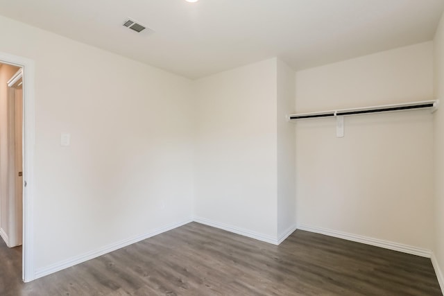 7945 Henson St, Houston, TX 77028 - unfurnished bedroom featuring wood finished floors and baseboards