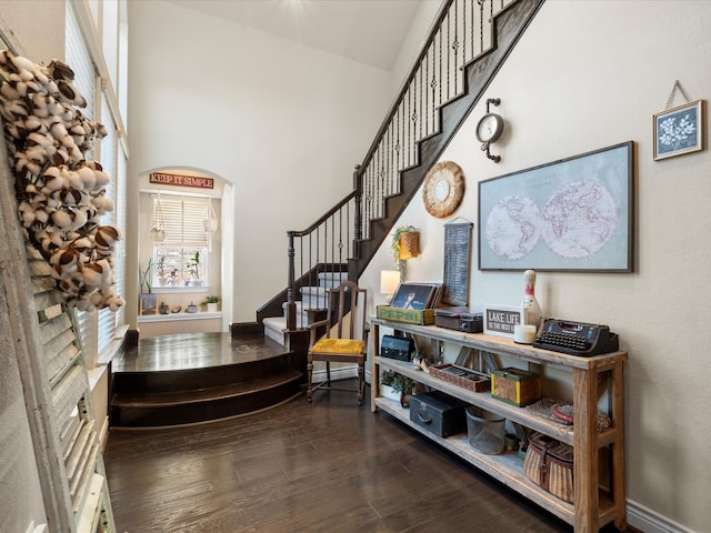 8322 Sands Bank Ln, Conroe, TX 77304 - entrance foyer featuring wood finished floors, stairway, and a towering ceiling